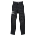 AMIRI Distressed Slim Tapered Jeans