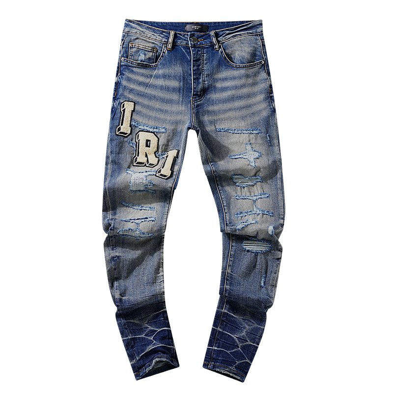 AMIRI Varsity Letter Appliqué Distressed Jeans